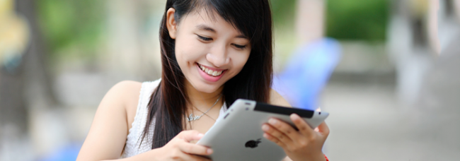 Young girl using tablet